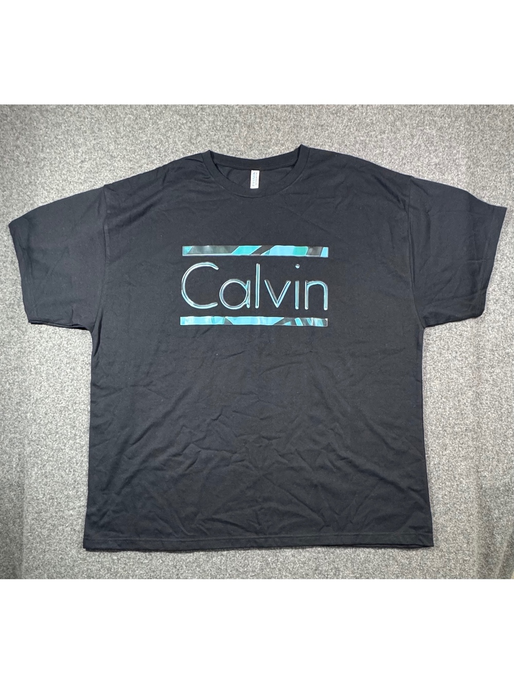 Men's 3XL Black Calvin Graphic T-Shirt with Turquoise Logo – Soft Cotton, Very G